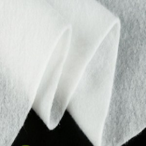 Needle punched nonwoven inner lining for home textiles